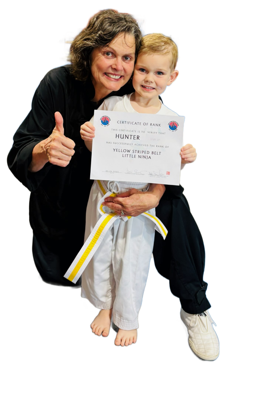 Little Ninja student earning rank certificate at Level 10 Martial Arts